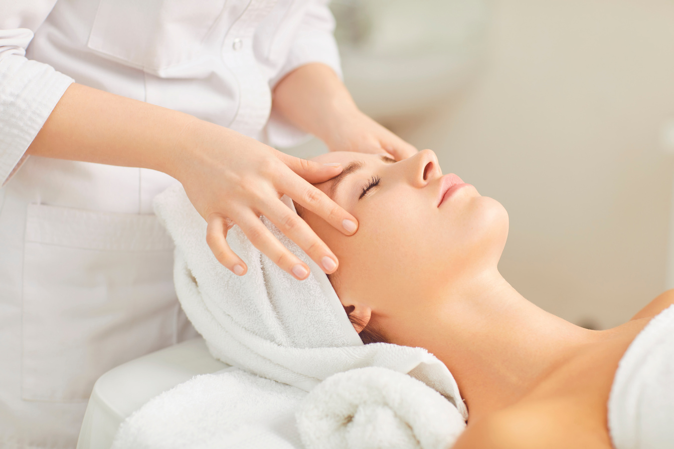 Beautician Makes Facial Massage to the Girl